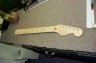 Modifying My Strat - The entire neck was stripped of finish and refinished with tung oil. The Fender logos have been replaced with new ones, which are for the correct year (1995).