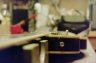 A mid '70's Les Paul Custom. - Checking the plane of the fretboard.